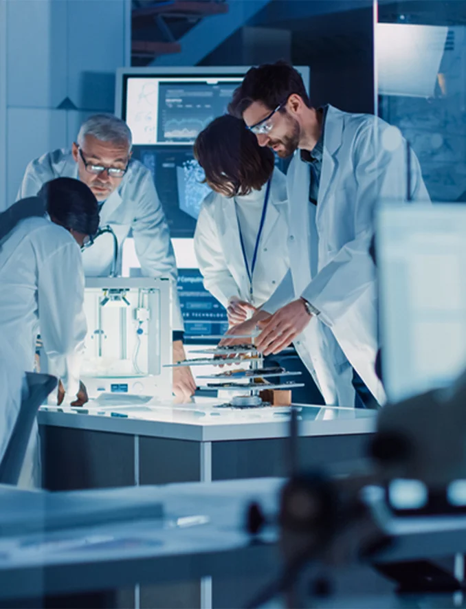 Researchers studying the Lymph Tonic herbal formula in a laboratory